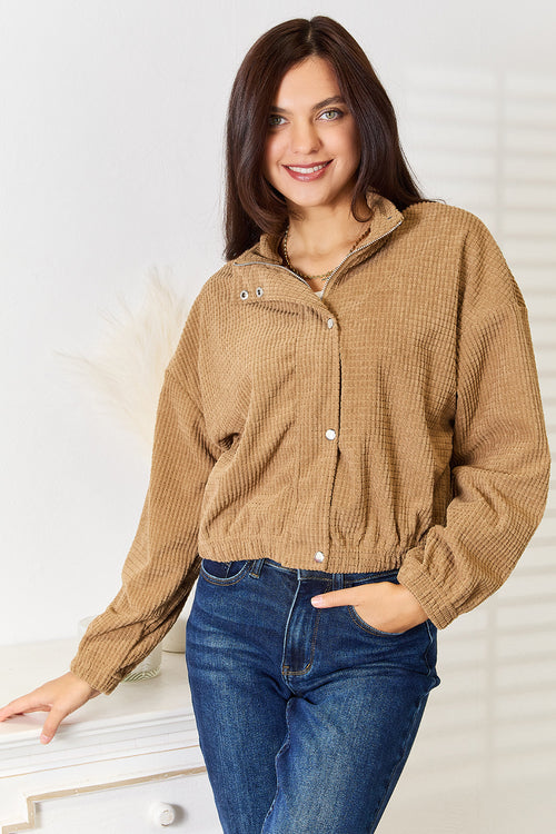 Woman wearing the Fleur camel textured drop-shoulder jacket, front view