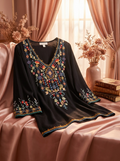 Private Garden Embroidered Tunic Tops In Vivid Colors — editorial